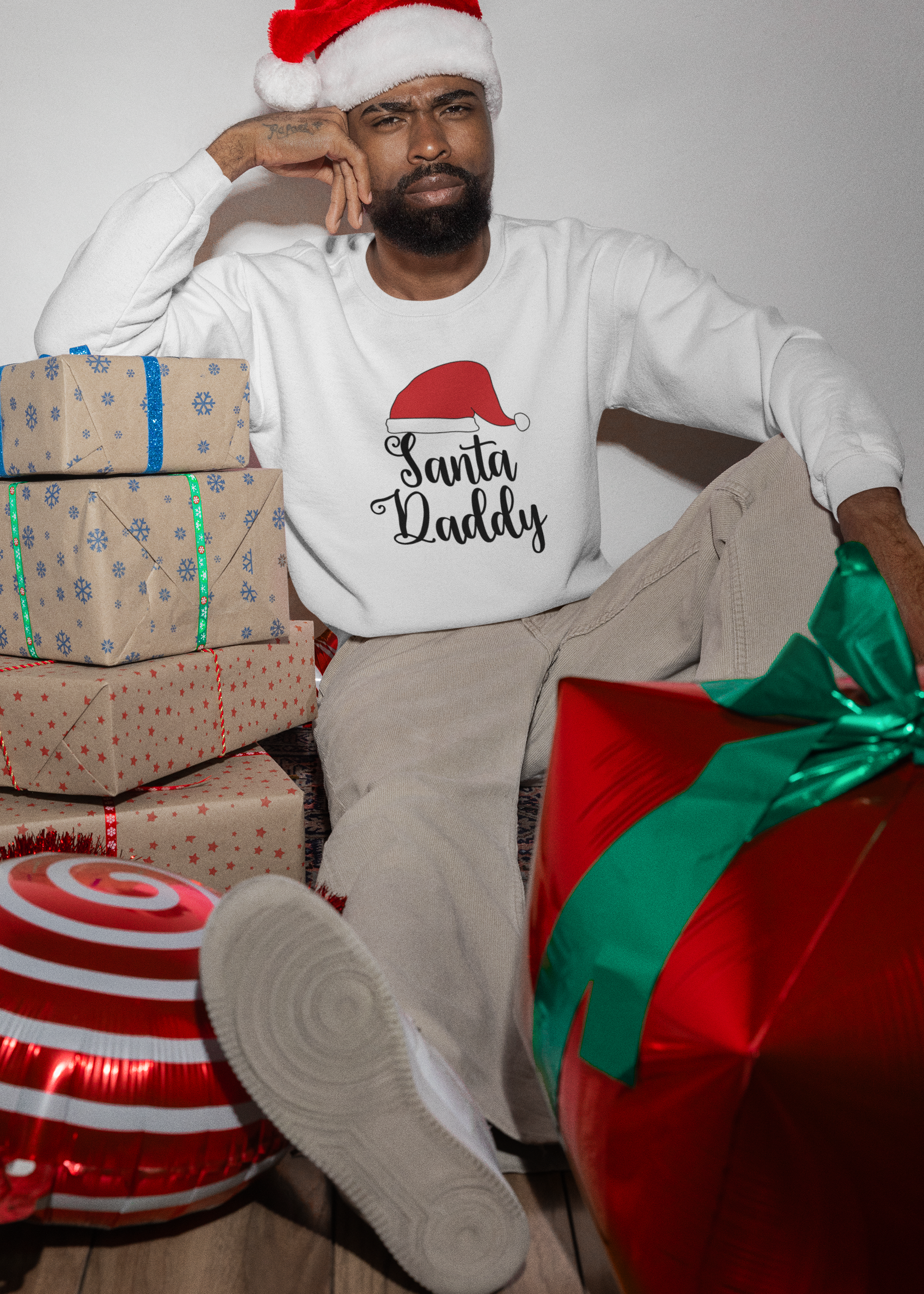 gildan-sweatshirt-mockup-of-a-serious-man-with-a-santa-claus-hat-in-a-christmas-party-m35930.png